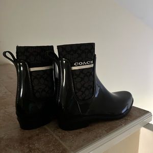 Coach black rubber ankle rain boots.